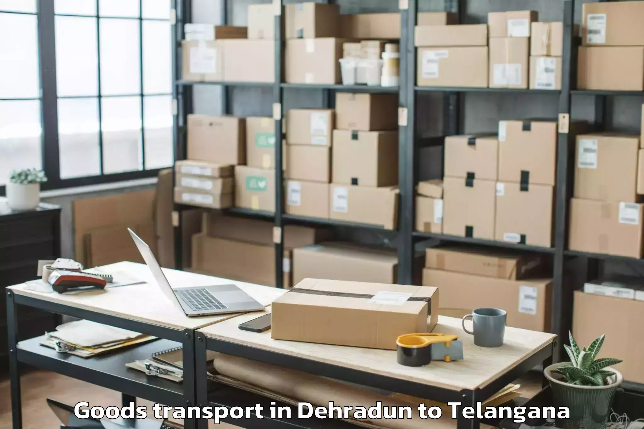 Reliable Dehradun to Nalsar University Of Law Hyder Goods Transport